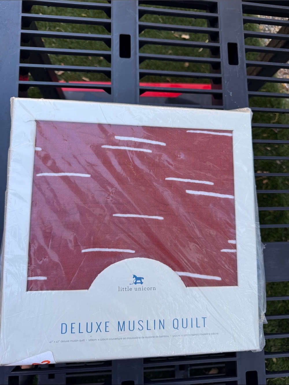 Little Unicorn Deluxe Muslin Quilt - Rust with White Dash